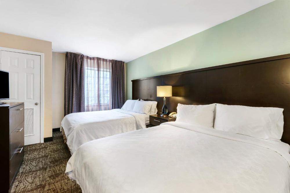 Two-Bedroom Suite with Three Queen Beds interior
